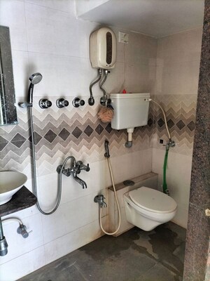 Bathroom in 1 BHK Apartment at Mahalaxmi Tulip, Saravali – for Sale
