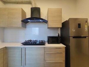 Kitchen in 2 BHK Apartment at Bhartiya City Nikoo Homes II, Thanisandra Main Road – for Rent