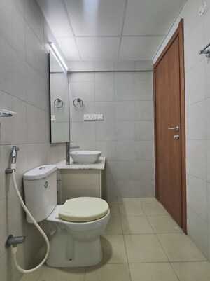 Bathroom in 2 BHK Apartment at Bhartiya City Nikoo Homes II, Thanisandra Main Road – for Rent