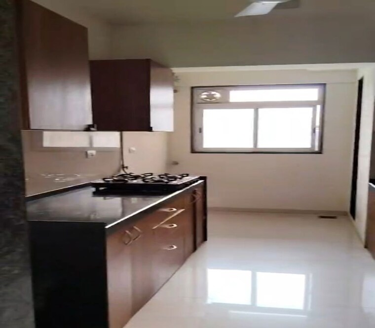 Kitchen, runwal-nirvana 2 Bedroom 785 Sq.Ft. Apartment In Parel Mumbai 10675040