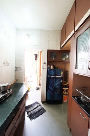 Kitchen in 1 BHK Apartment at Ghatlodia – for Sale