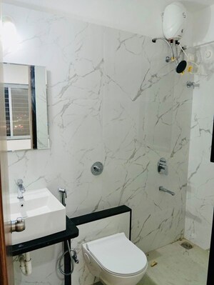 Bathroom in 3 BHK Apartment at Raga Top Towers, Wakad – for Rent