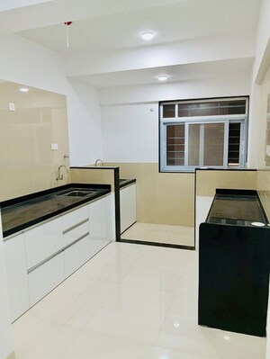 Kitchen in 3 BHK Apartment at Raga Top Towers, Wakad – for Rent