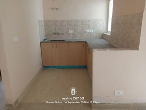Kitchen in 2 BHK Apartment at Amrapali Enchante, Tech Zone 4 Greater Noida – for Rent