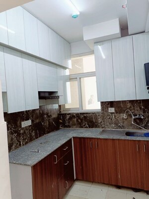 Kitchen in 2 BHK Apartment at Mahagun Mywoods III, Sector 16c Greater Noida – for Rent