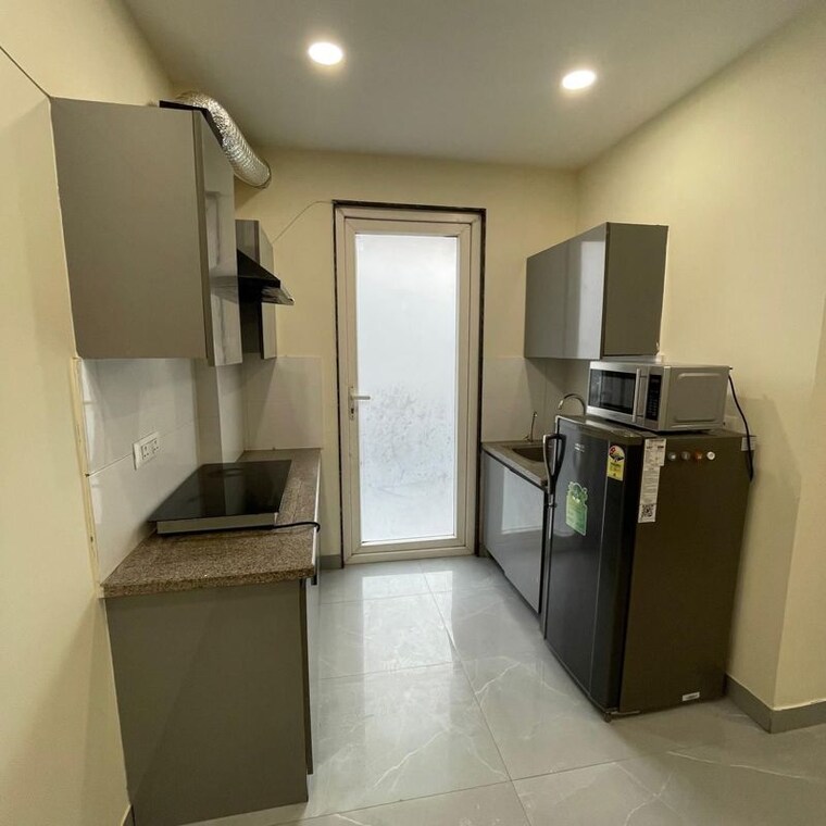 Kitchen, surya-aastha-greens 3 Bedroom 1556 Sq.Ft. Apartment In Sector 4 Greater Noida Greater Noida 10675509