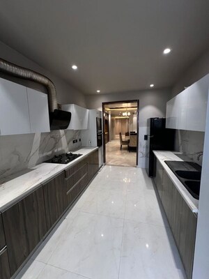 Kitchen in 4 BHK Builder Floor at Sushant Lok I – for Rent