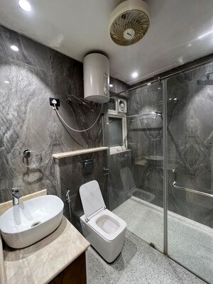 Bathroom in 4 BHK Builder Floor at Sushant Lok I – for Rent