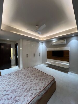 Bedroom in 4 BHK Builder Floor at Sushant Lok I – for Rent