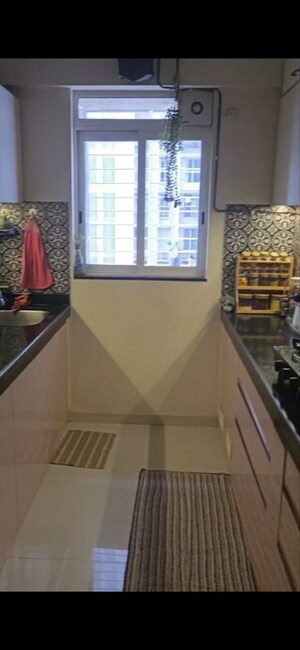 Kitchen in 1 BHK Apartment at Lodha Amara, Kolshet Road – for Sale
