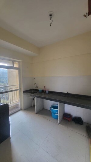 Kitchen in 2 BHK Apartment at Bharat Ecovistas, Shilphata – for Rent