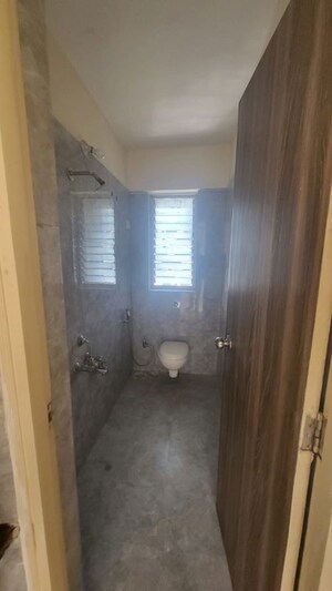 Bathroom in 2 BHK Apartment at Bharat Ecovistas, Shilphata – for Rent