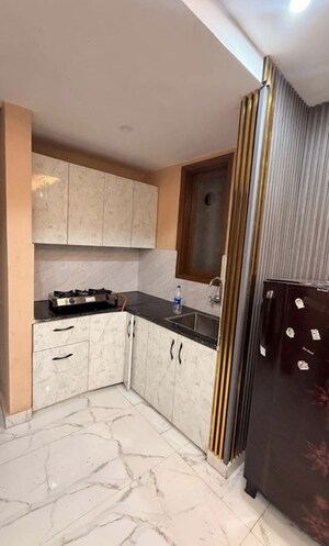 Kitchen in 2 BHK Builder Floor at Ramesh Nagar – for Rent