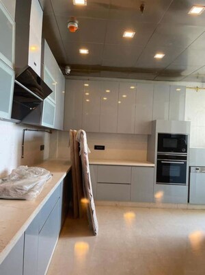 Kitchen in 4 BHK Apartment at Orchid Petals, Sector 49 – for Sale