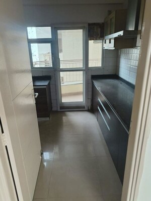 Kitchen in 4 BHK Apartment at Orchid Petals, Sector 49 – for Sale