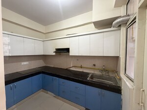 Kitchen in 3 BHK Apartment at Proview Officer City 2, Raj Nagar Extension – for Rent