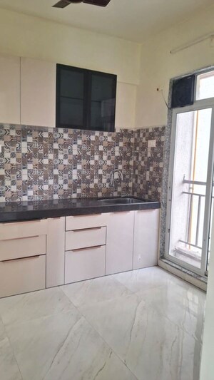 Kitchen in 2 BHK Apartment at Bilad Bloom Field, Ulwe Sector 18 – for Rent