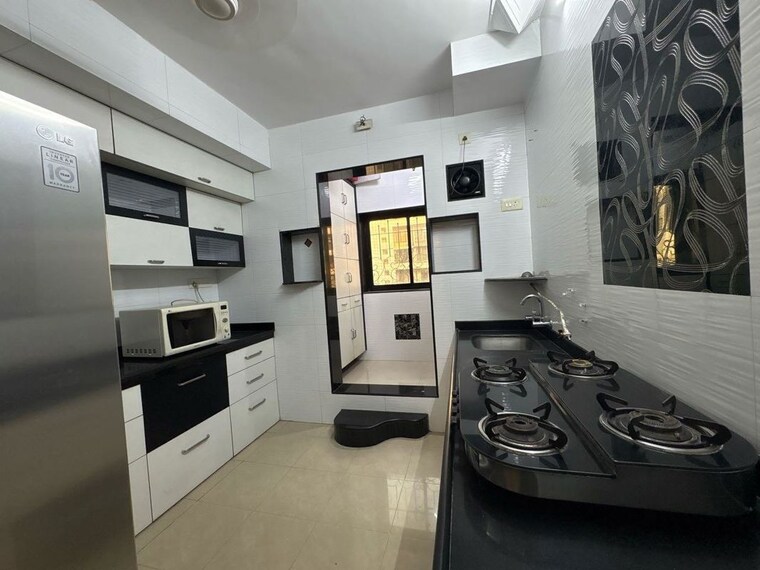 Kitchen, neelkanth-heights-shivai-nagar 2 Bedroom 712 Sq.Ft. Apartment In Shivai Nagar Thane 10658237