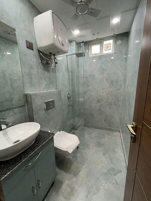 Bathroom in 3.5 BHK Builder Floor at Chittaranjan Park – for Rent