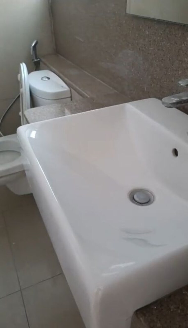 Bathroom, emaar-palm-gardens 3 Bedroom 1900 Sq.Ft. Apartment In Sector 83 Gurgaon 10675863