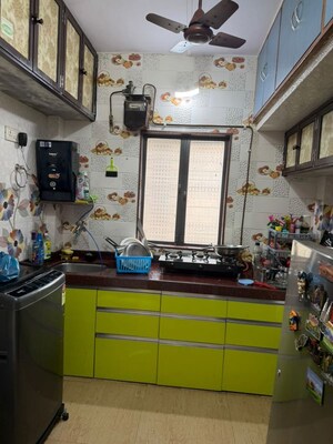 Kitchen in 1 BHK Apartment at Gundecha Valley of Flowers, Kandivali East – for Rent