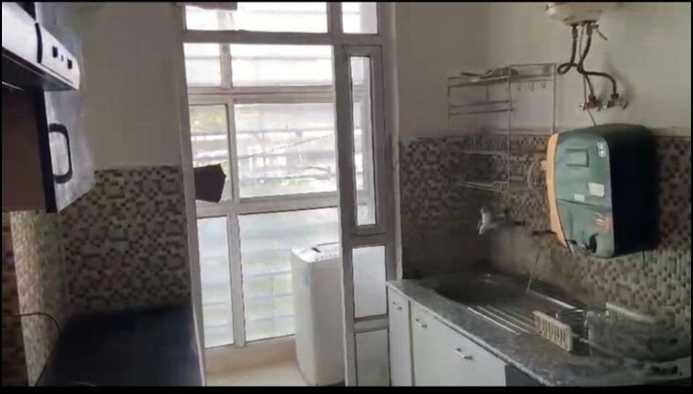Kitchen, ansal-api-celebrity-gardens 3 Bedroom 2200 Sq.Ft. Apartment In Sushant Golf City Lucknow 10675880