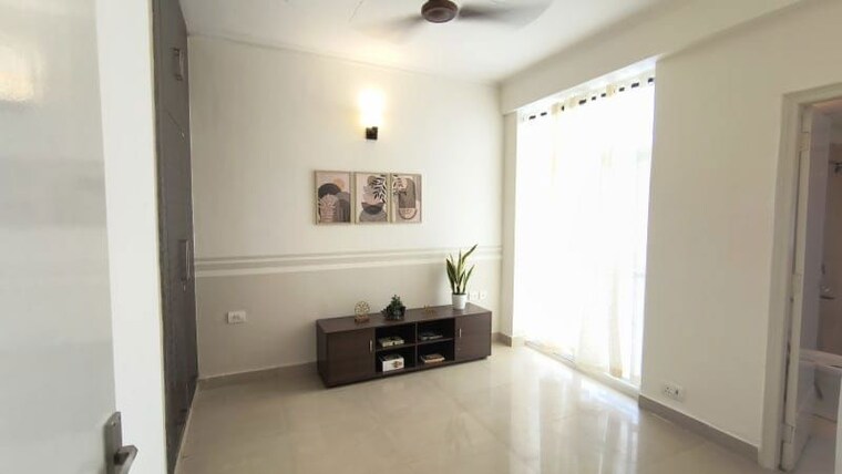Living Room, ajnara-le-garden 2.5 Bedroom 1140 Sq.Ft. Apartment In Sector 16b Greater Noida Greater Noida 10675911