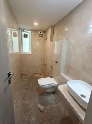 Bathroom in 3 BHK Apartment at Unique Aura Mumbai, Santacruz West – for Rent