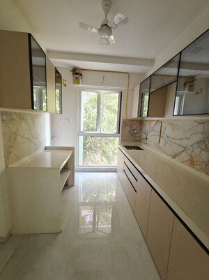 Kitchen in 3 BHK Apartment at Unique Aura Mumbai, Santacruz West – for Rent