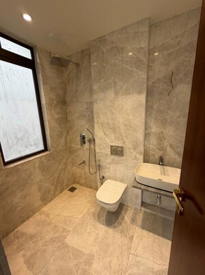Bathroom in 4 BHK Apartment at Jasani Apollo Heights, Khar West – for Sale