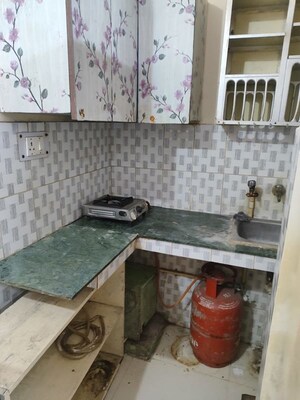 Kitchen in 1 RK Apartment at Arun Vihar Sector 37, Sector 37 – for Rent