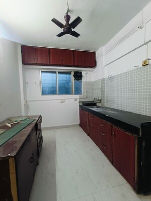 Kitchen in 2 BHK Apartment at Wadgaon Sheri – for Rent