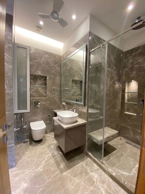 Bathroom in 4 BHK Apartment at Green Park – for Rent