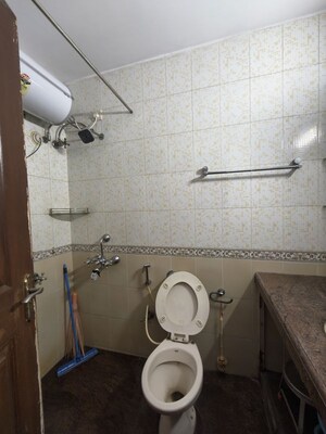 Bathroom in 2 BHK Apartment at Harshvardhan CHS Powai, Powai – for Rent