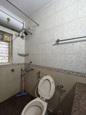 Bathroom in 2 BHK Apartment at Harshvardhan CHS Powai, Powai – for Rent