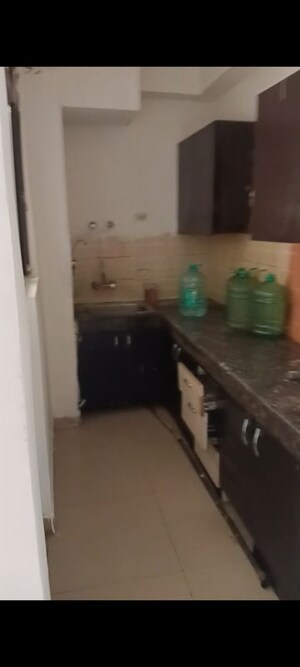 Kitchen in 2 BHK Apartment at Ajnara Integrity, Raj Nagar Extension – for Rent