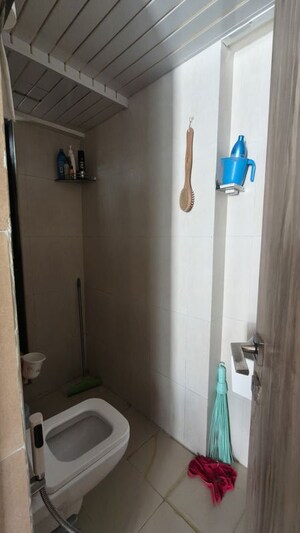 Bathroom in 1 BHK Apartment at Kanakia Rainforest, Andheri East – for Rent