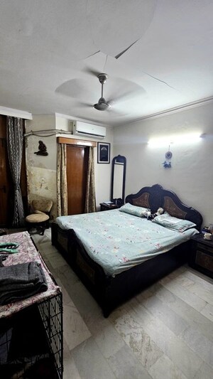 Bedroom in 3 BHK Builder Floor at Chittaranjan Park – for Sale
