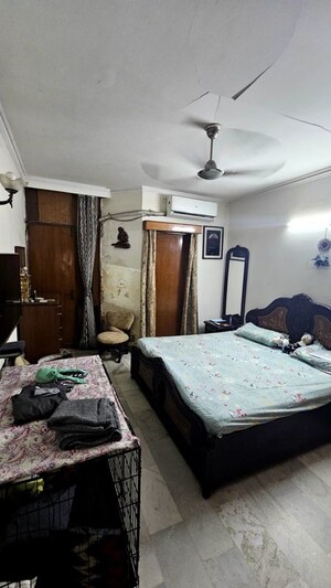 Bedroom in 3 BHK Builder Floor at Chittaranjan Park – for Sale
