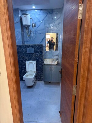 Bathroom in 3 BHK Builder Floor at Dashrath Puri – for Sale