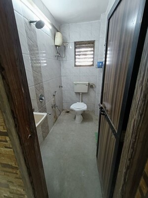 Bathroom in 2.5 BHK Apartment at Shree Amit Nagar CHS, Andheri West – for Rent