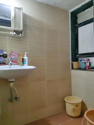 Bathroom in  Apartment at Raunak Heights, Ghodbunder Road – for Rent