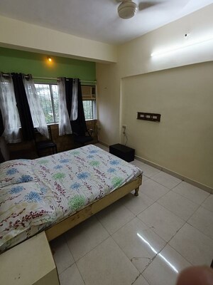 Bedroom in 2 BHK Apartment at Aaram Nagar CHS, Versova – for Rent