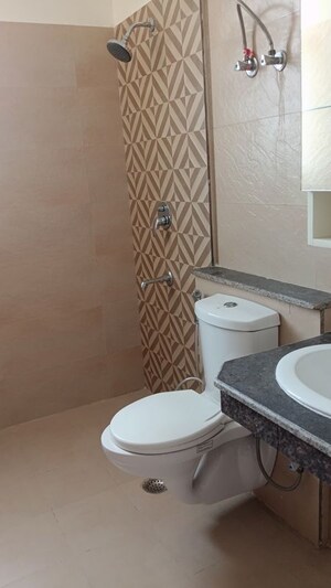 Bathroom in 3 BHK Apartment at ATS Homekraft Pious Hideaways, Sector 150 – for Rent