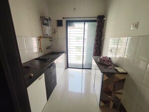 Kitchen in 2 BHK Apartment at Kalash Kumkum Apartment, Virar West – for Rent
