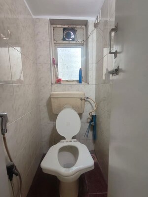 Bathroom in 1 BHK Apartment at Dheeraj Pooja, Malad West – for Rent
