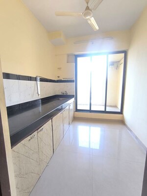 Kitchen in 2 BHK Apartment at Sheth Auris Bliss, Malad West – for Sale
