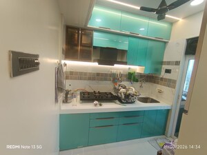 Kitchen in 1 BHK Apartment at Om Aditya Paraiso, Shilphata – for Sale