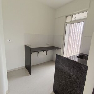 Kitchen in 2 BHK Apartment at Paradigm Antalya, Oshiwara – for Sale