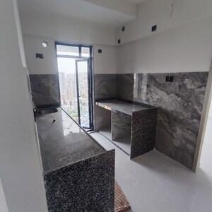 Kitchen in 2 BHK Apartment at Paradigm Antalya, Oshiwara – for Sale